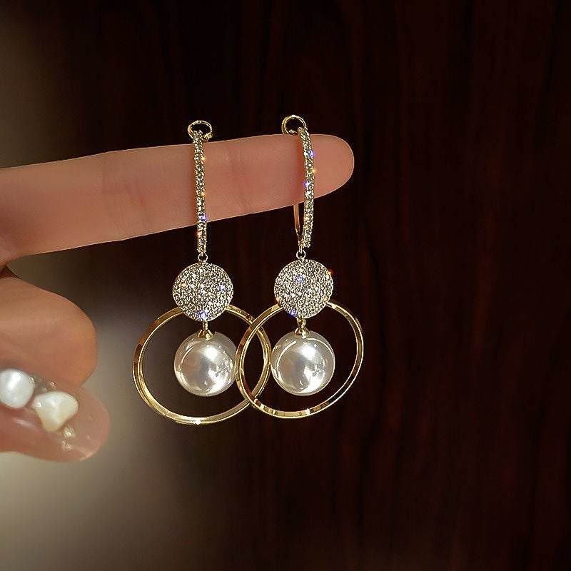 Luxurious Earrings with Pearls and Zircons