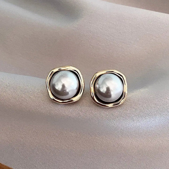 Elegant Earrings Made of Black Pearls