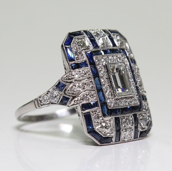Vintage Ring Made of Polished Silver and Blue Zircon